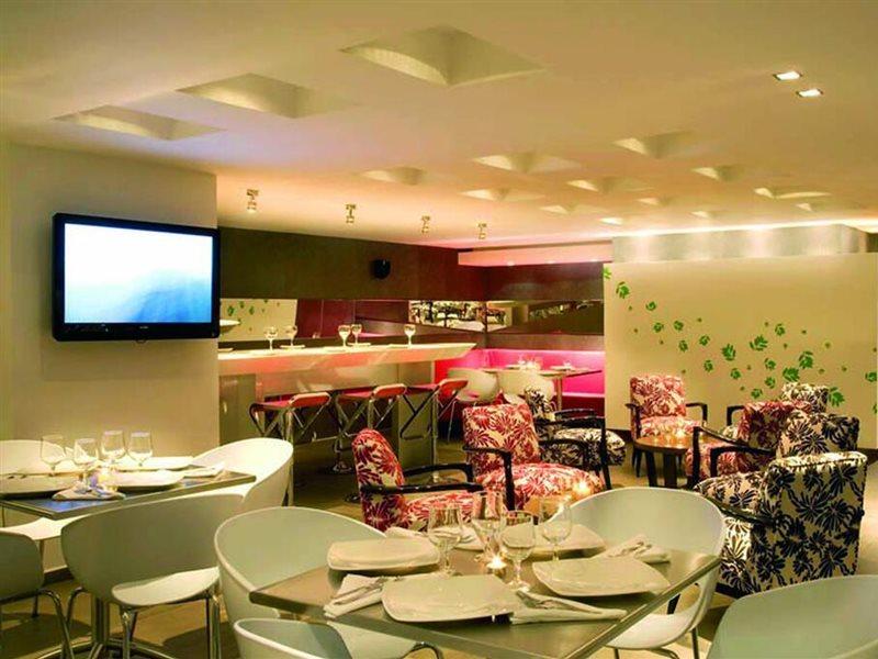 San Simon Hotel Pereira By Soratama Extérieur photo The interior of the restaurant