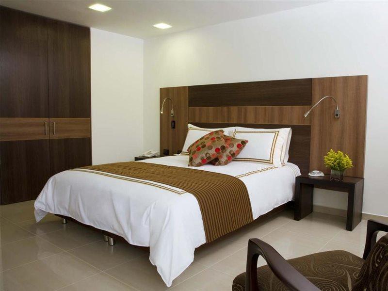 San Simon Hotel Pereira By Soratama Extérieur photo A bedroom