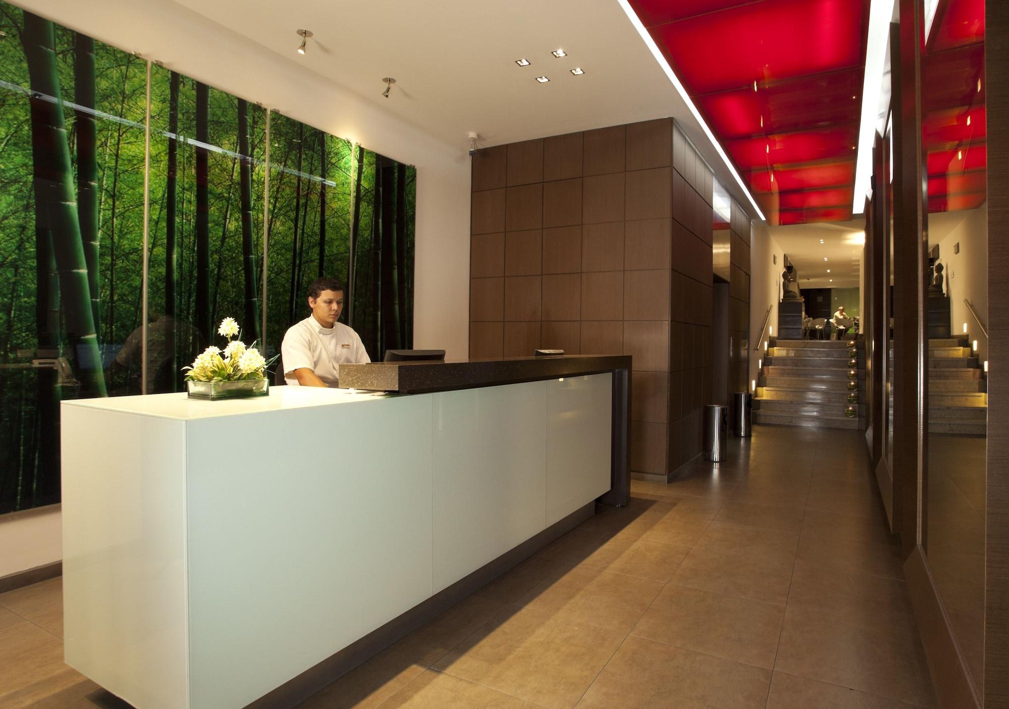 San Simon Hotel Pereira By Soratama Extérieur photo The reception area of the hotel