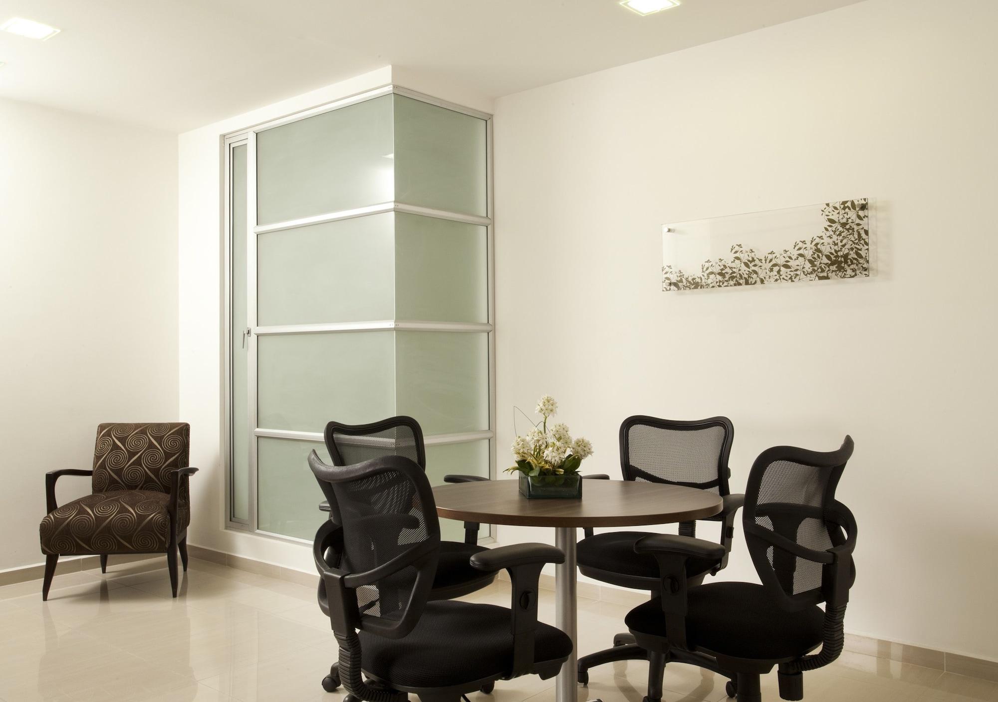San Simon Hotel Pereira By Soratama Extérieur photo A typical meeting room