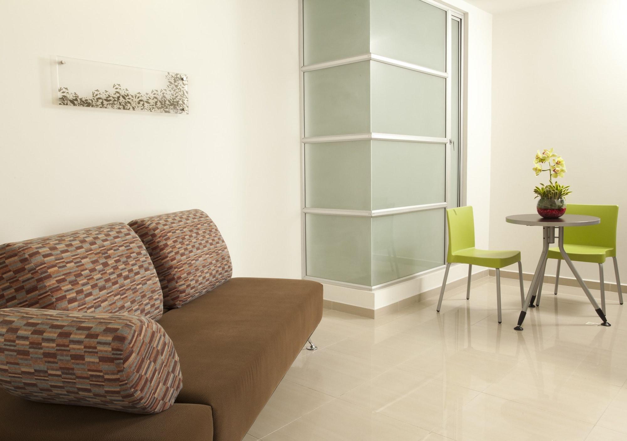 San Simon Hotel Pereira By Soratama Extérieur photo A room with a vinyl floor