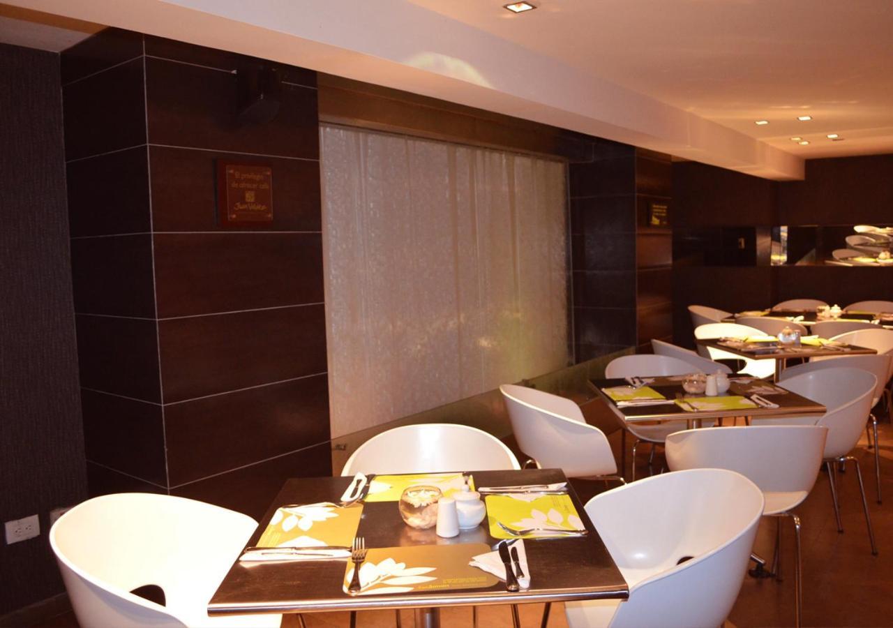 San Simon Hotel Pereira By Soratama Extérieur photo The interior of the restaurant